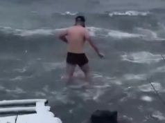 Qytetari në Pogradec sfidon acarin. Hyn në liqen në -4°C.