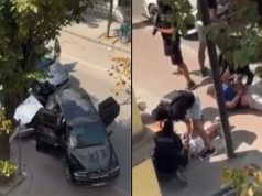 Tre persona të shtrirë në trotuar, momenti i arrestimit të Ramadan Zotos. 43-vjeçari u kap me pistoletë me fishekë në fole